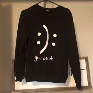 Black T Labeled “You Decide”